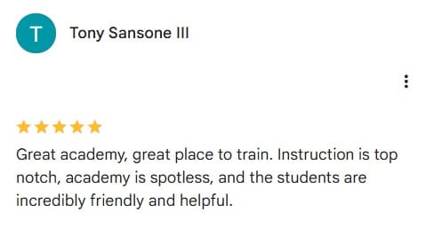 Screenshot of a five-star Google review from an adult student about the facility